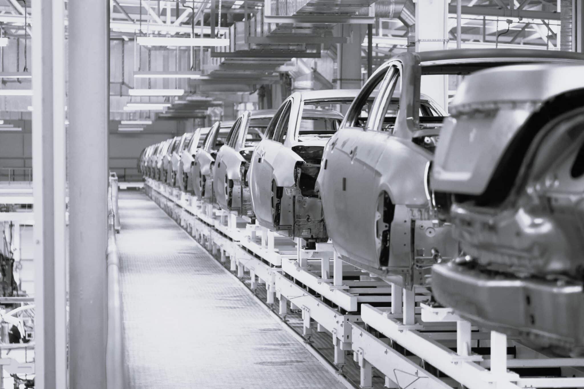 Modern automobile production line, automated production equipment. Shop for the Assembly of new modern cars. The way of Assembly of the car on the Assembly line at the plant